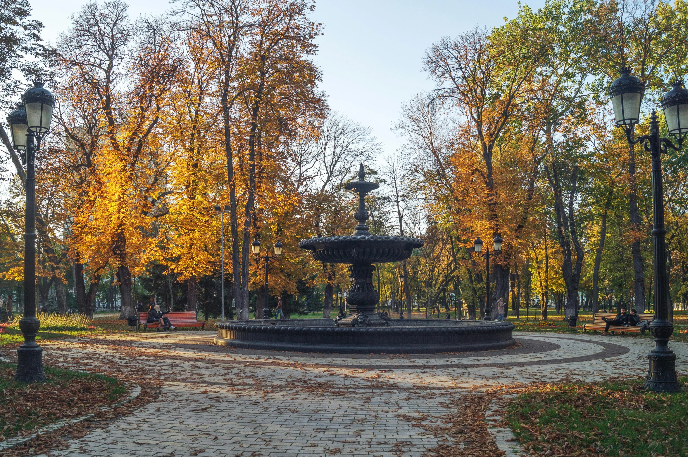 an image of a park setting with a fountain