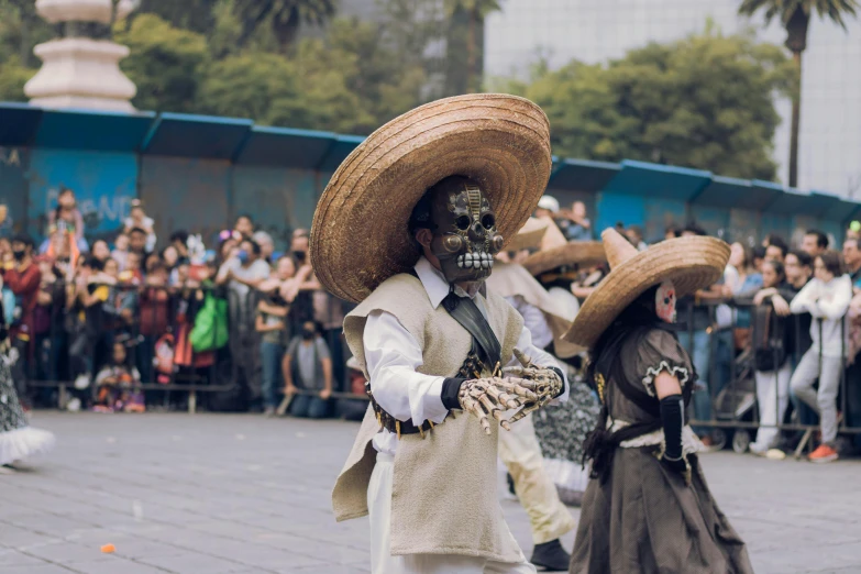 a group of people with mexican day of the dead makeup