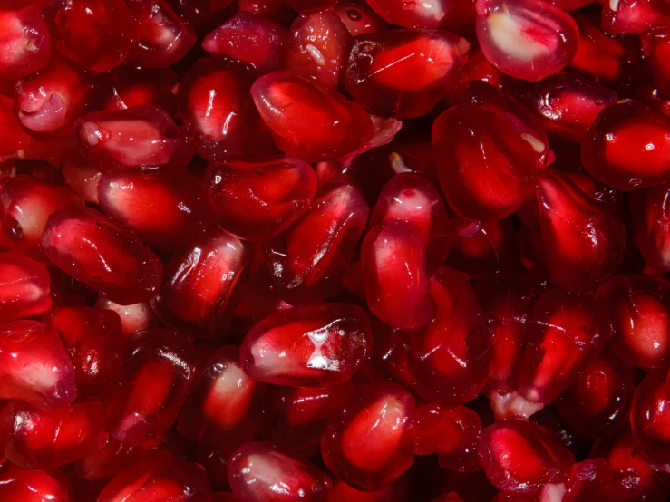 some red gourds with water drops on them