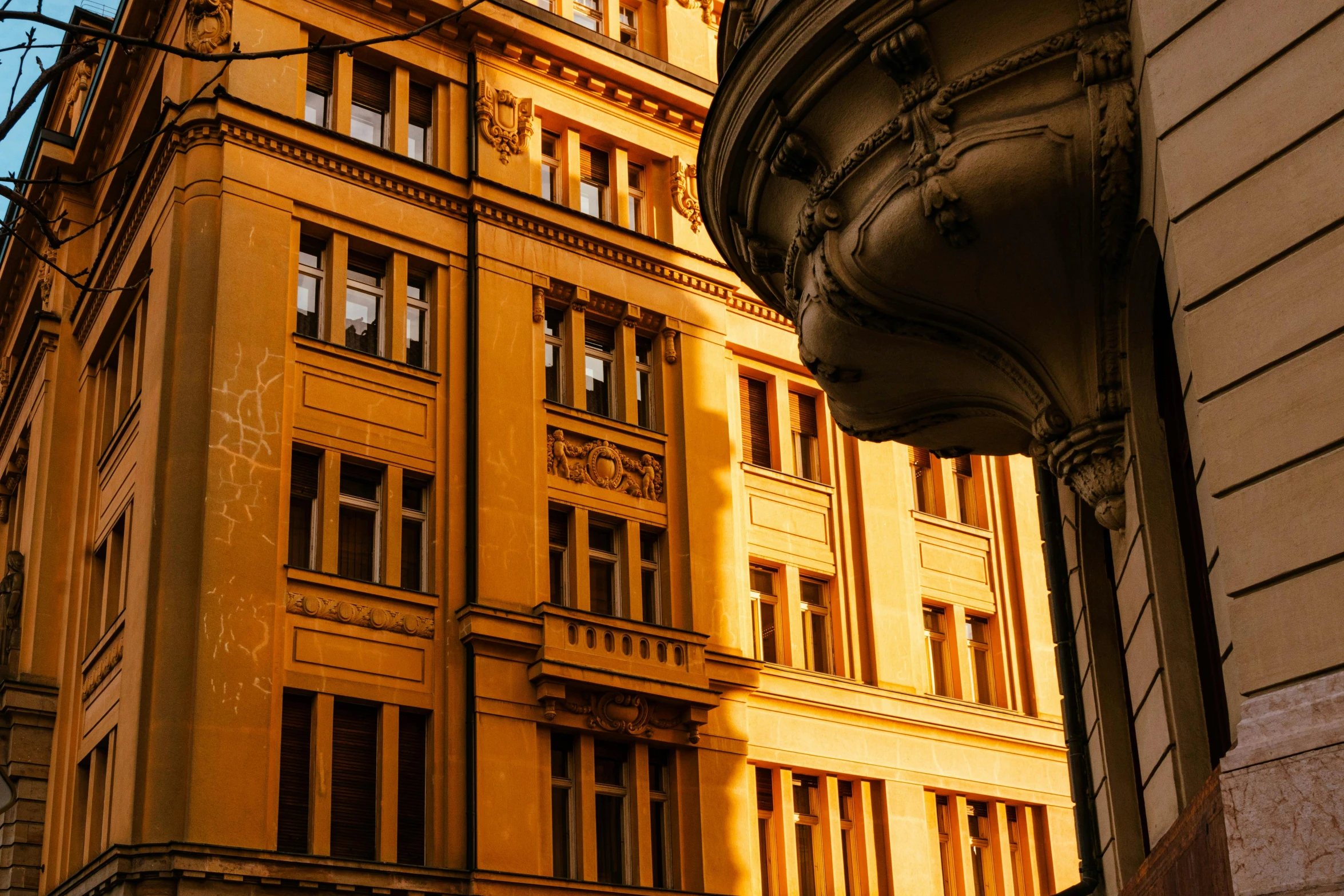 a street light is shown next to an old building