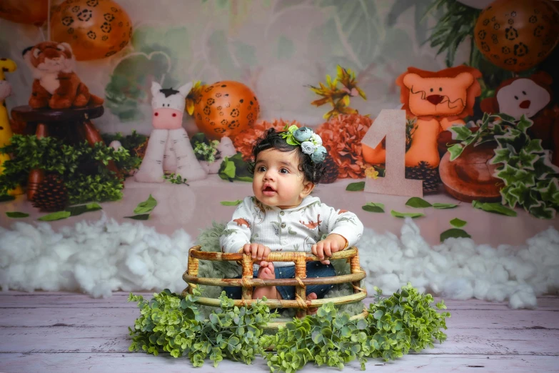 a baby sitting in a wicker basket and stuffed animals