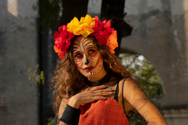 a woman with an elaborate face painting on her body