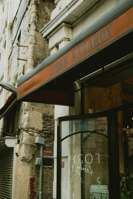 the entrance to the restaurant that sells lunch and wine