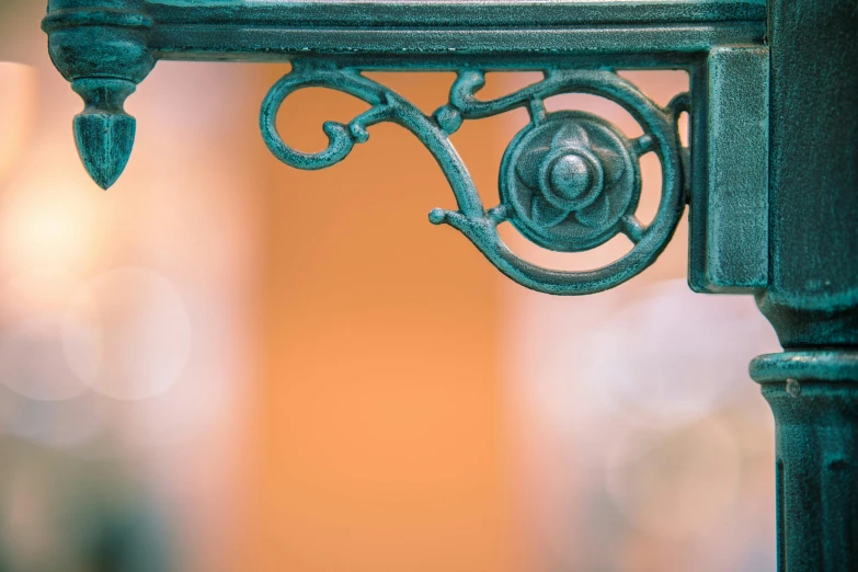 a corner of a fence made of iron