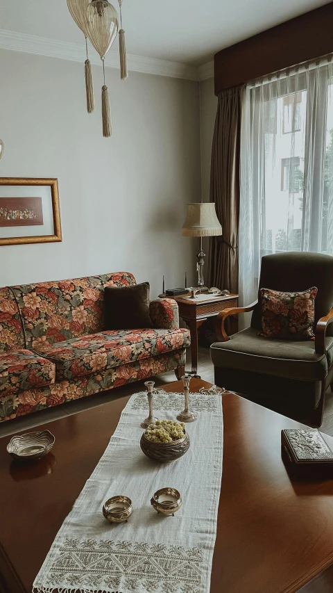 living room furniture with lace table runner in place