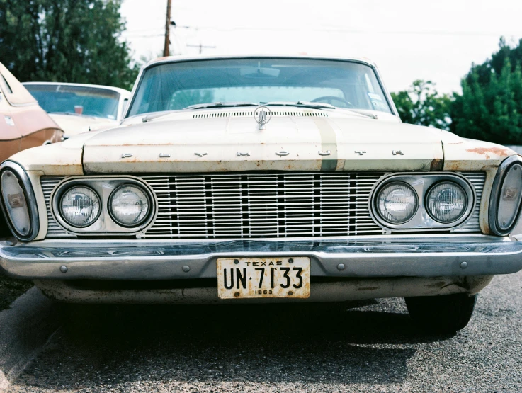 a car that has been painted old and rusty