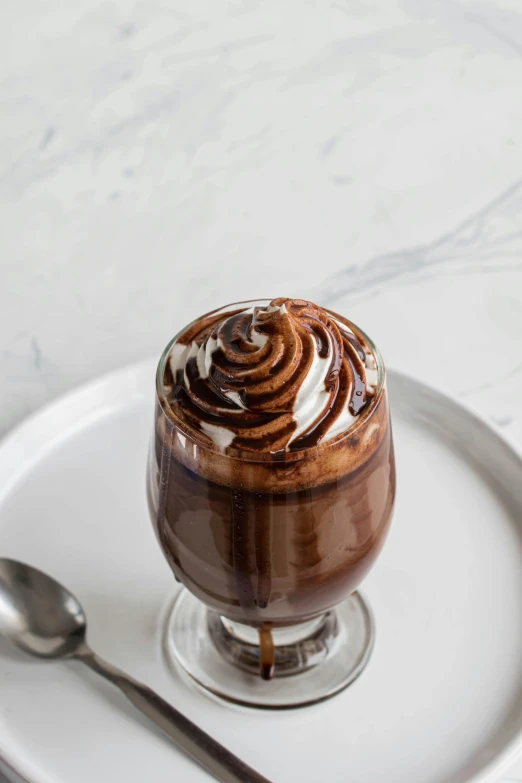 a picture of a  chocolate dessert in a small glass