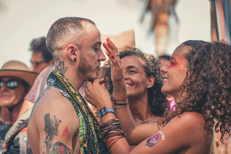 people stand outside and smile at each other