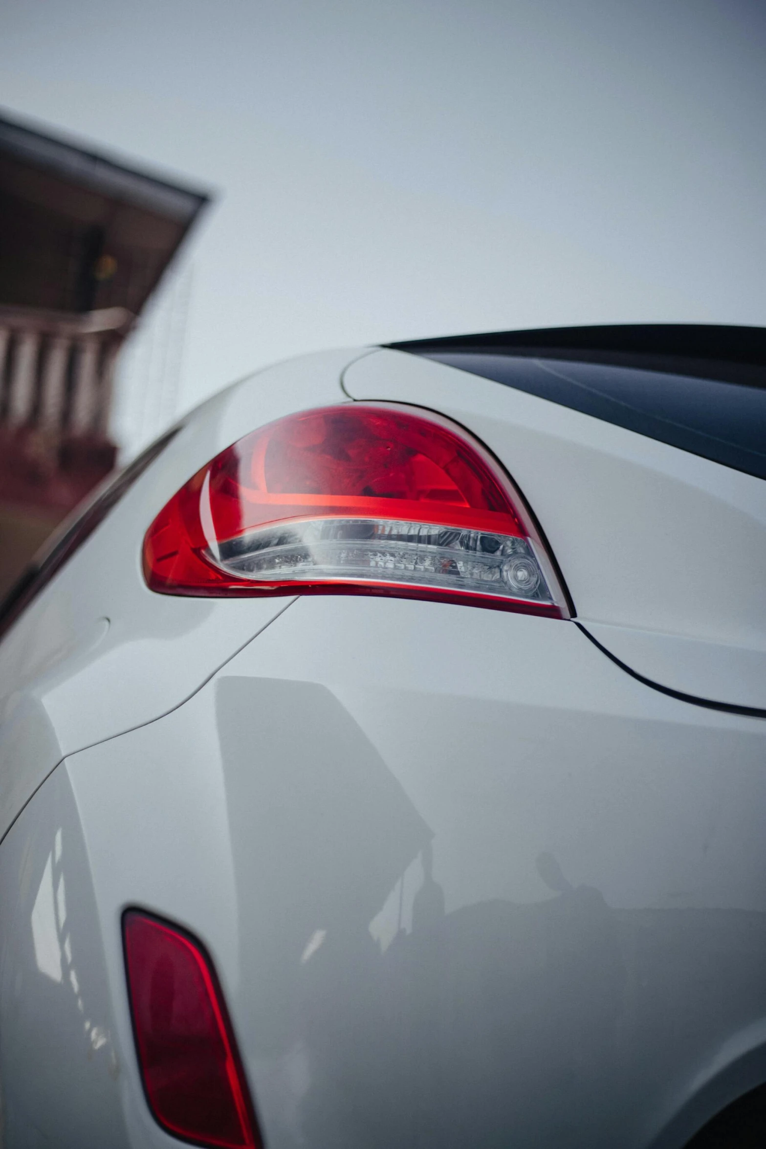 a close up of the back bumper and side lights of a sports car