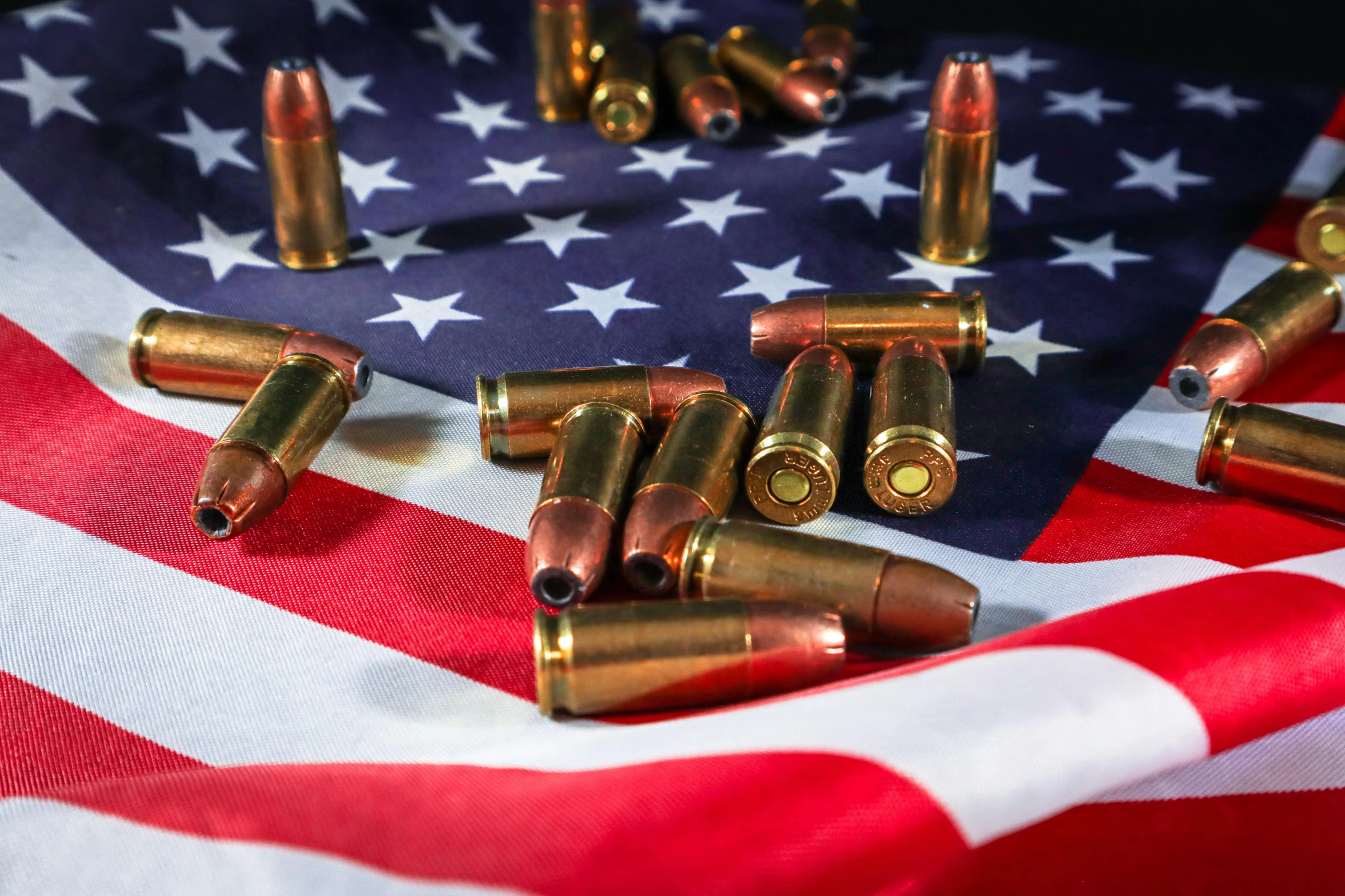 bullet shells on american flag with stars and stripes