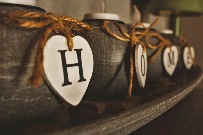 a display case is holding decorative name tags