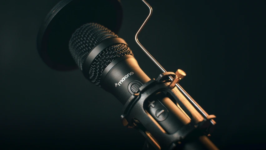 the microphone is attached to a metal hook