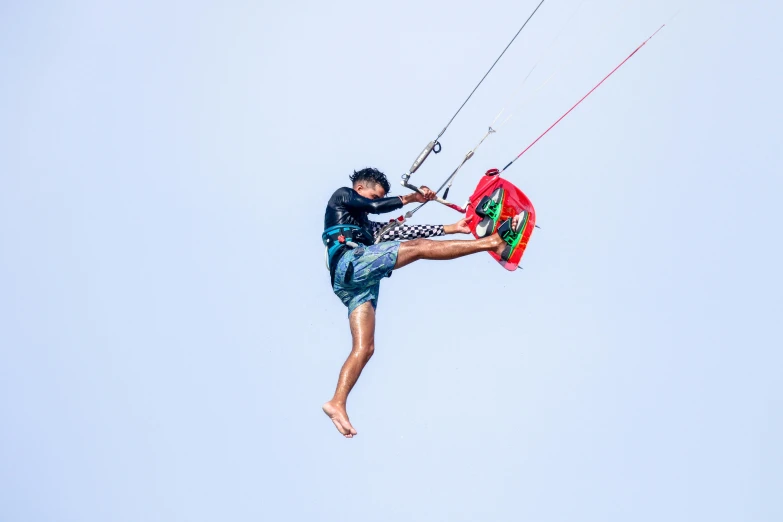 a person is in the air doing some aerial tricks