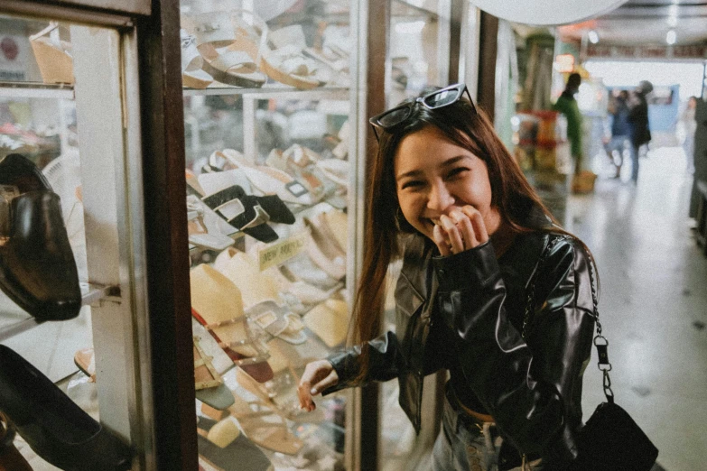 girl wearing all black looking at her camera