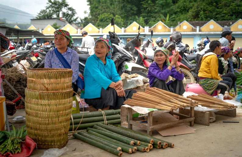 there are many people selling bamboo on this street