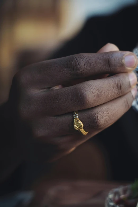 a person with their hands on a table