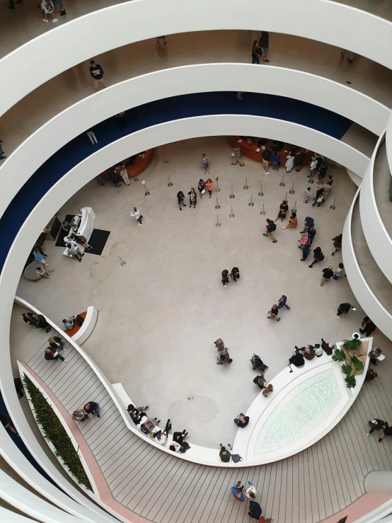 an overhead view of a building with multiple levels of staircase