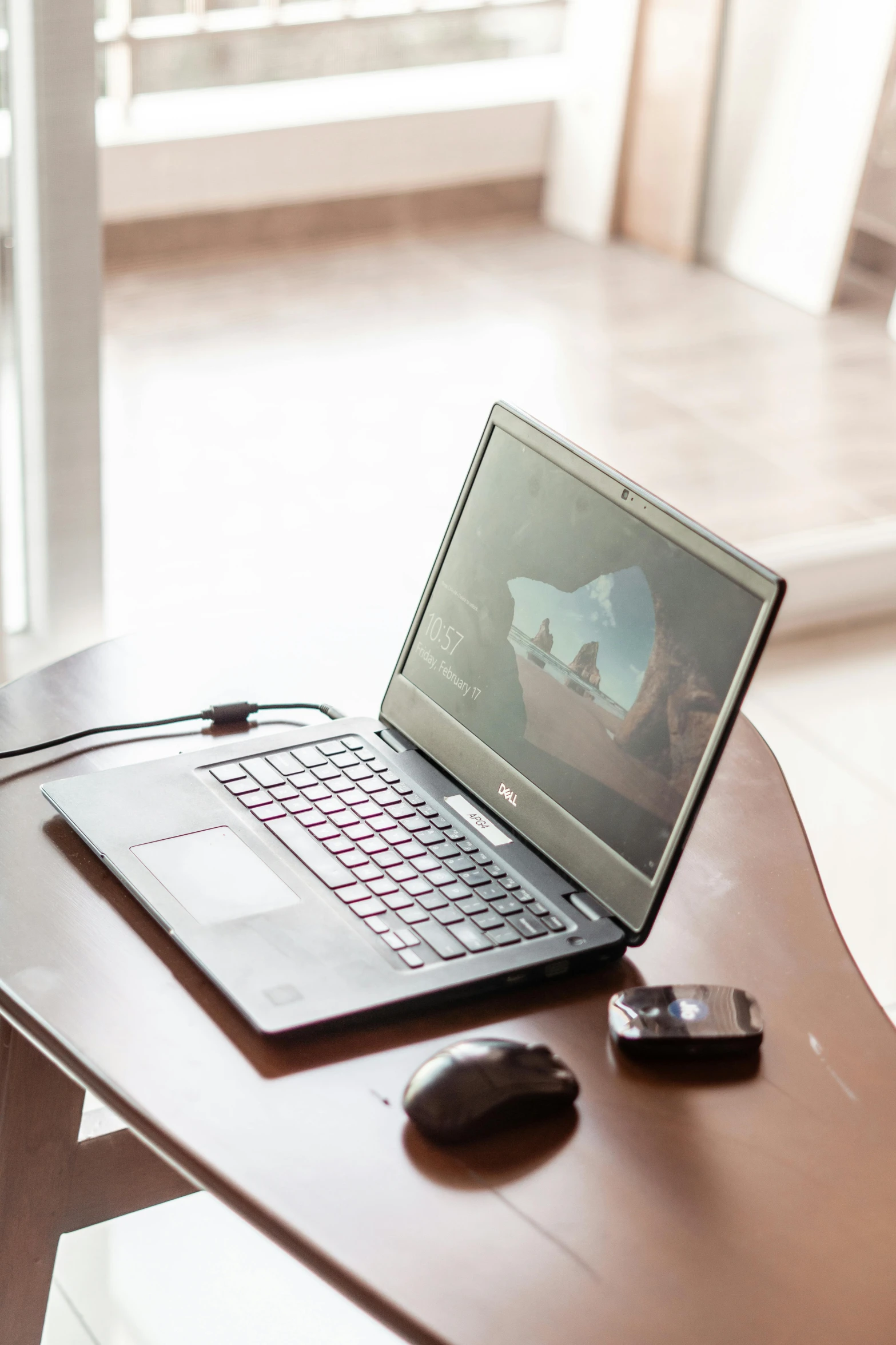 a computer laptop sitting on top of a desk