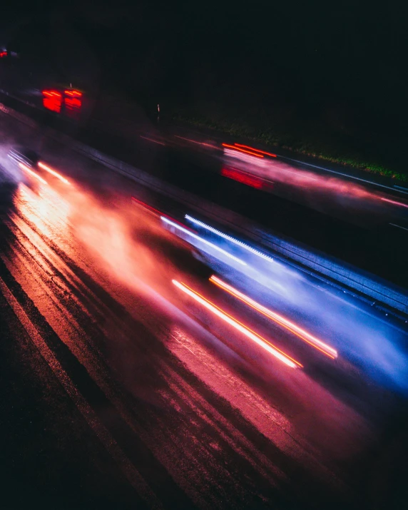 a blurry po of cars traveling on a freeway