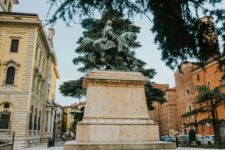 a large white horse statue in front of a building