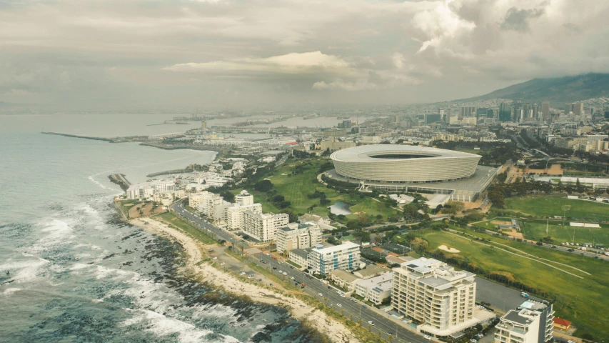 the aerial view of an ocean side city