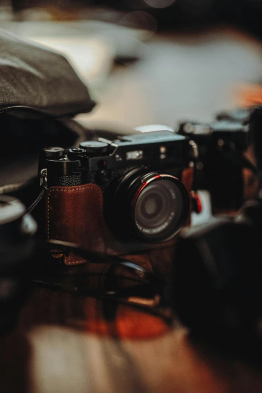 an old fashioned camera sitting on top of a table