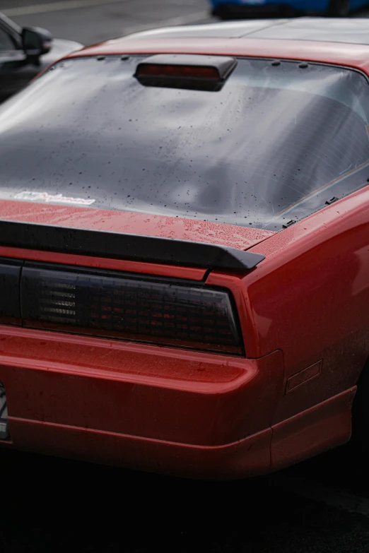 an image of a car that has rain drops on it