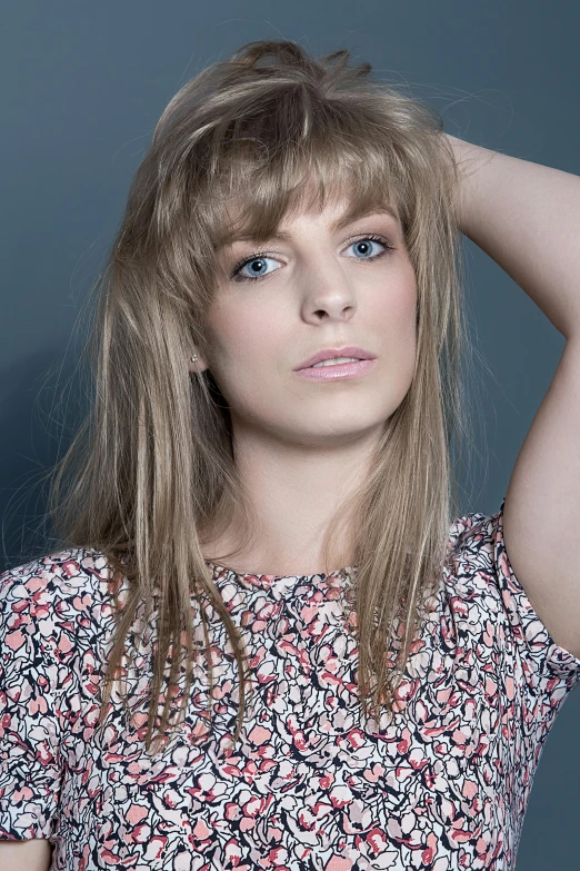 a close up of a person with long hair