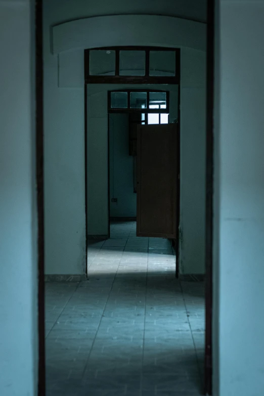doorway view through door to the light inside an empty room