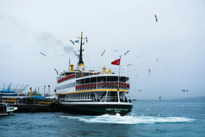 the large boat is traveling in the ocean