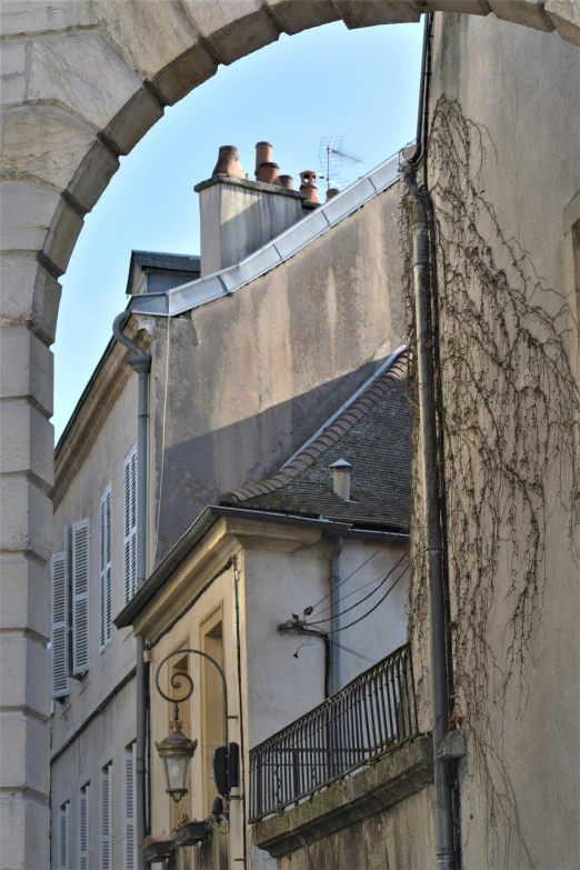 an arch at the entrance to a building