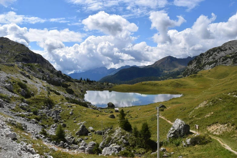 an unpaved trail goes through the valley