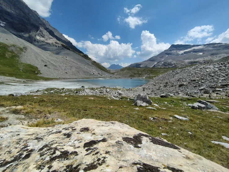 two mountains with small lakes in the middle of them