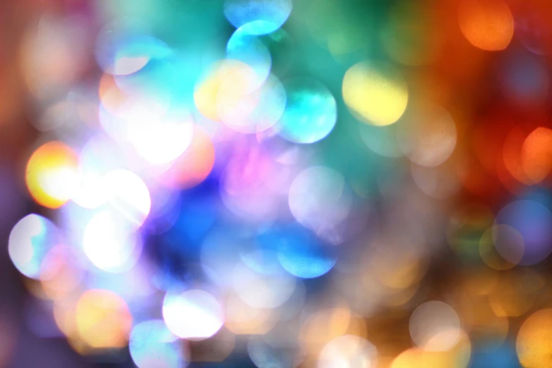 blurry colorful lights are shown on the surface