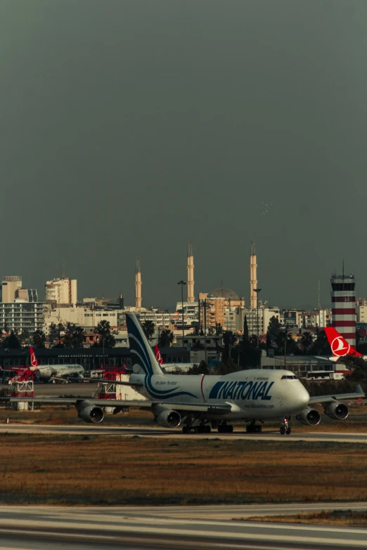 the two planes are driving on the runway