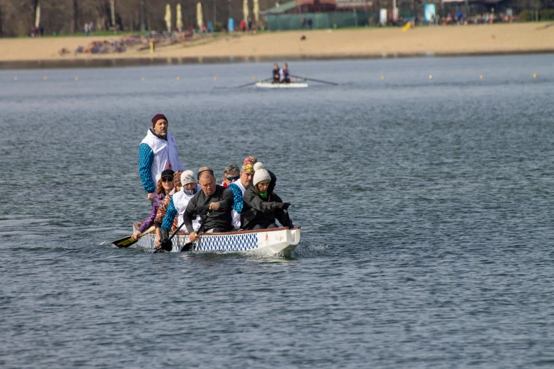 a group of people on the back of a boat