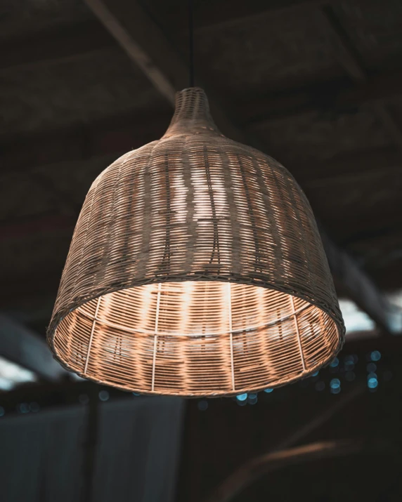 an umbrella like light in a building with lights