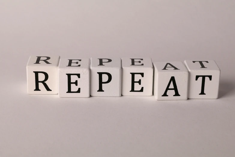 some type of letter blocks spelling repeal on a table