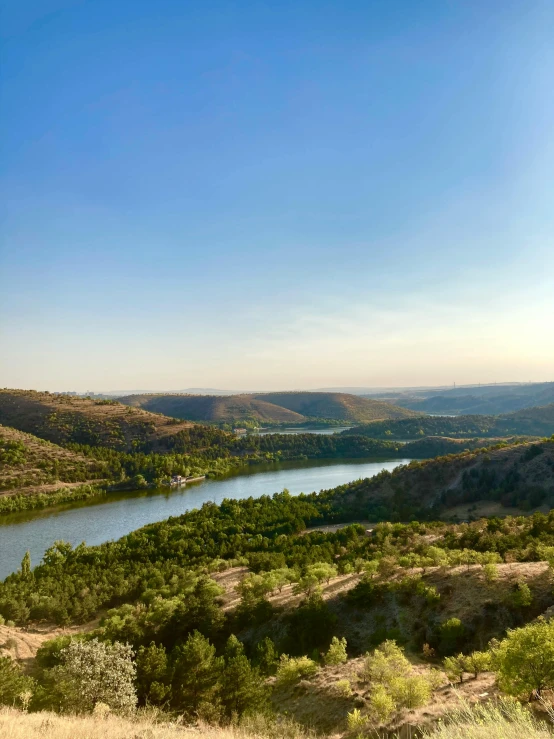 a body of water that is in the middle of a hill