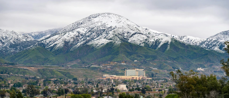 there is a clock tower on top of the mountain