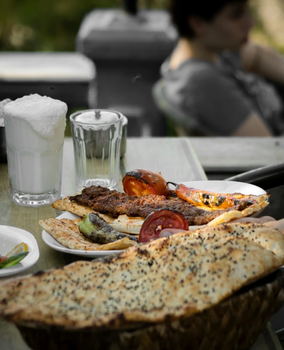 a table with food items on it outside