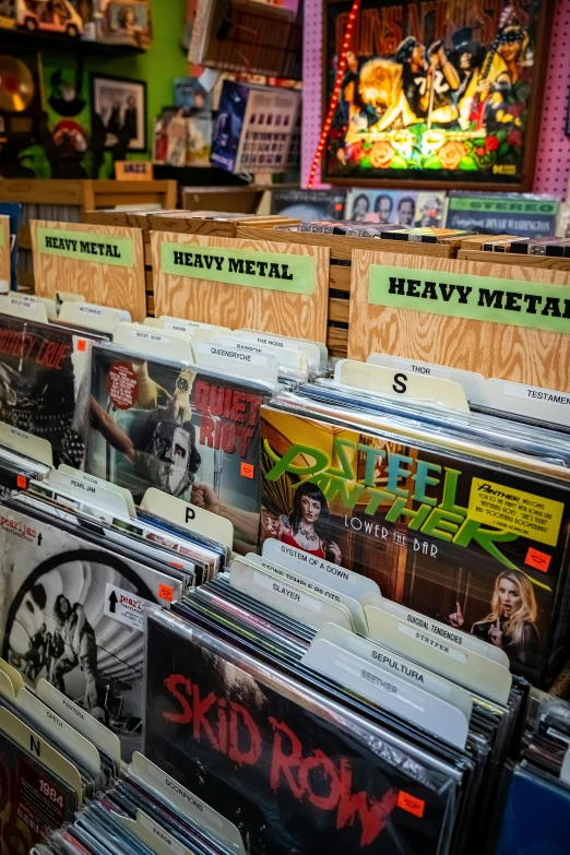 a rack of old records with some different titles