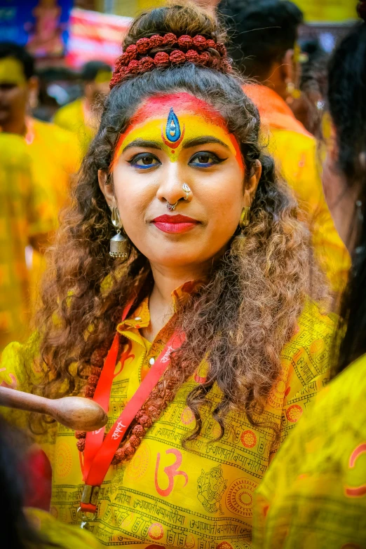 a woman with colorful makeup on her face