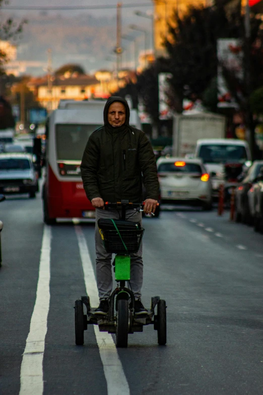 a man riding on the street while using a skate board