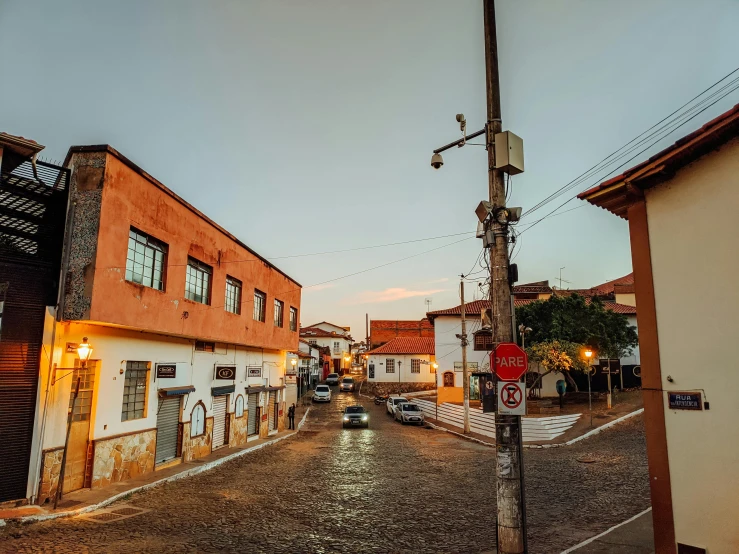 a street corner in the middle of a small village