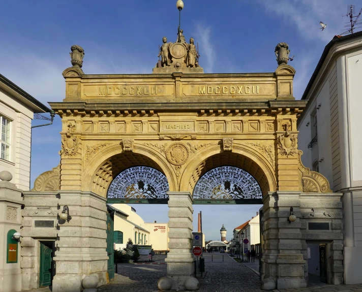 the arched arches on the building are painted gold