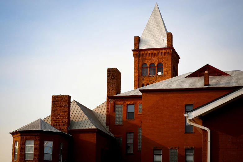 a picture of a house with a tall tower