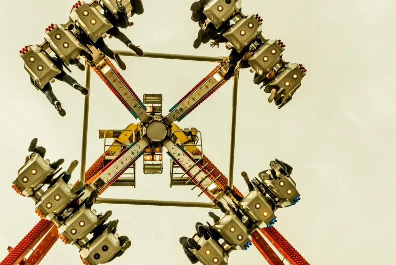 a ferris wheel s from underneath the wheels