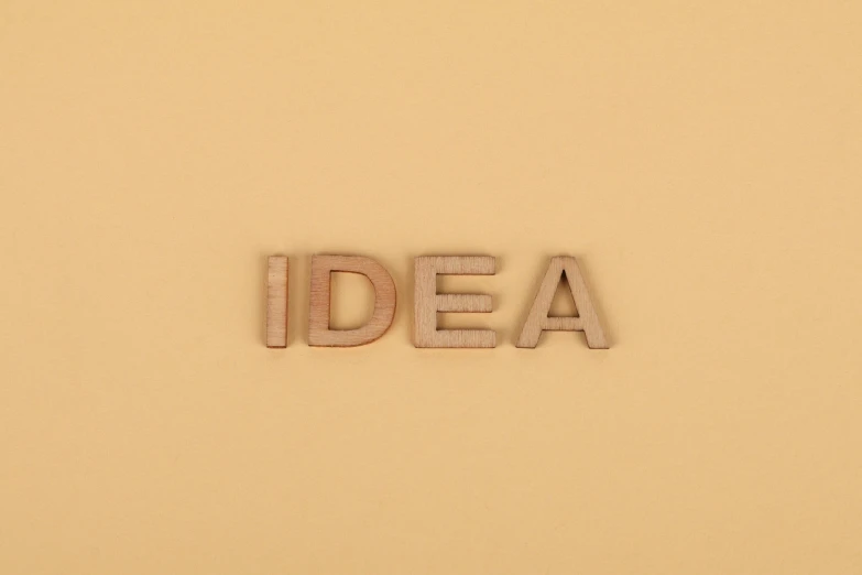 an idea type is printed from wood letters