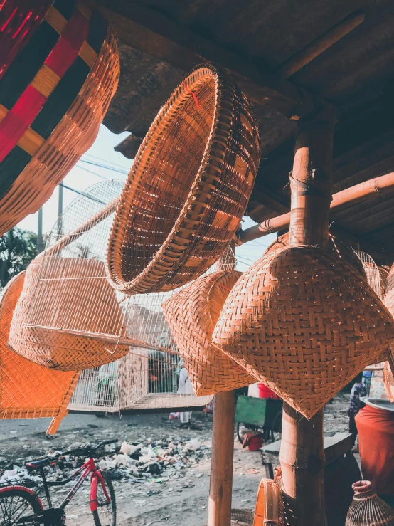 there are some very large woven baskets hanging up